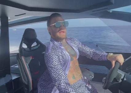 Conor McGregor declares he is 'Mr Ireland,' flaunting a Lamborghini yacht while rapping a classic track