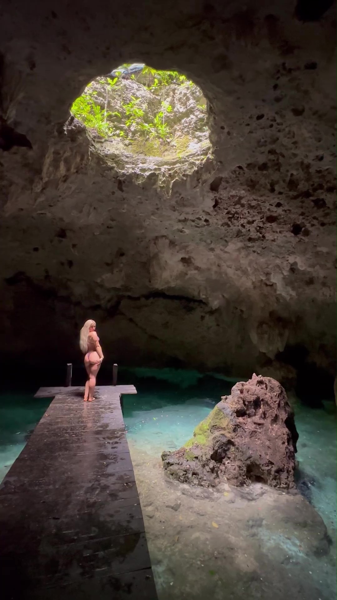 Elle Brooke Joins the No Bra Club and Shows off Bum in the Sacred Underground Pool on a Mexican Getaway