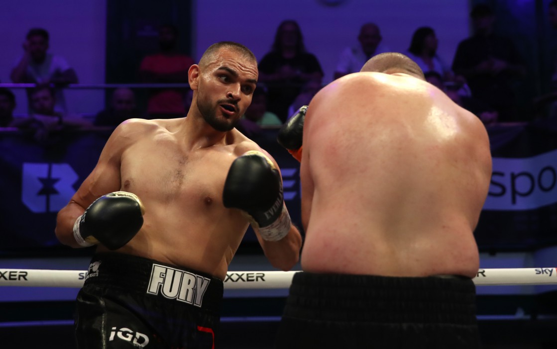 What is Roman Fury's pro boxing history, and how is he connected to Tyson?
