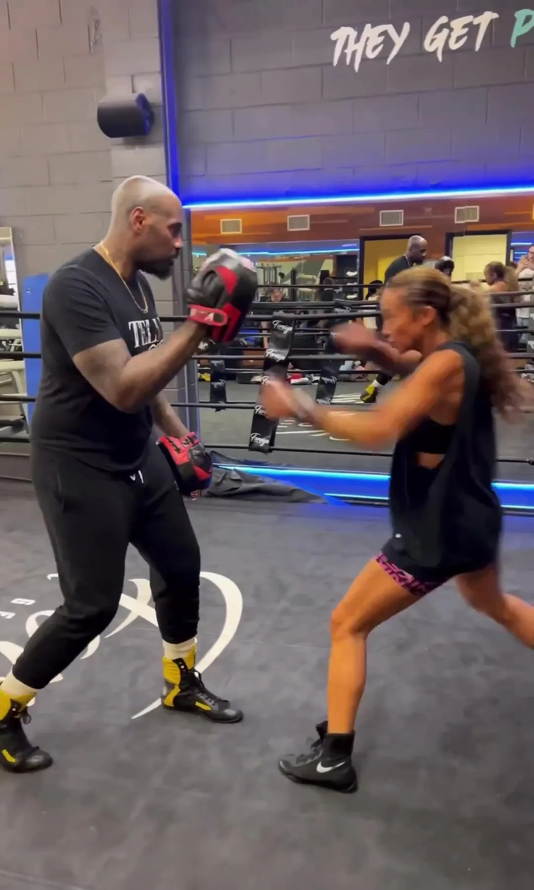 Kate Abdo, a CBS Sports boxing star, impresses Deontay's coach.