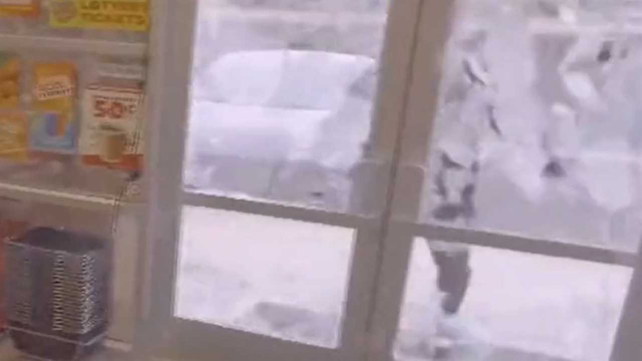 Watch this incredible moment as Tyson Fury's opponent Francis Ngannou SHATTERS a shop door by pushing it when he was supposed to pull.