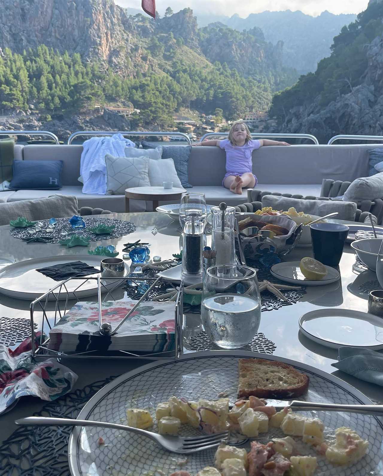 Conor McGregor relaxes on his PS2.7m Lamborghini Yacht with budgie smugglers and dressing gowns while on holiday with family.
