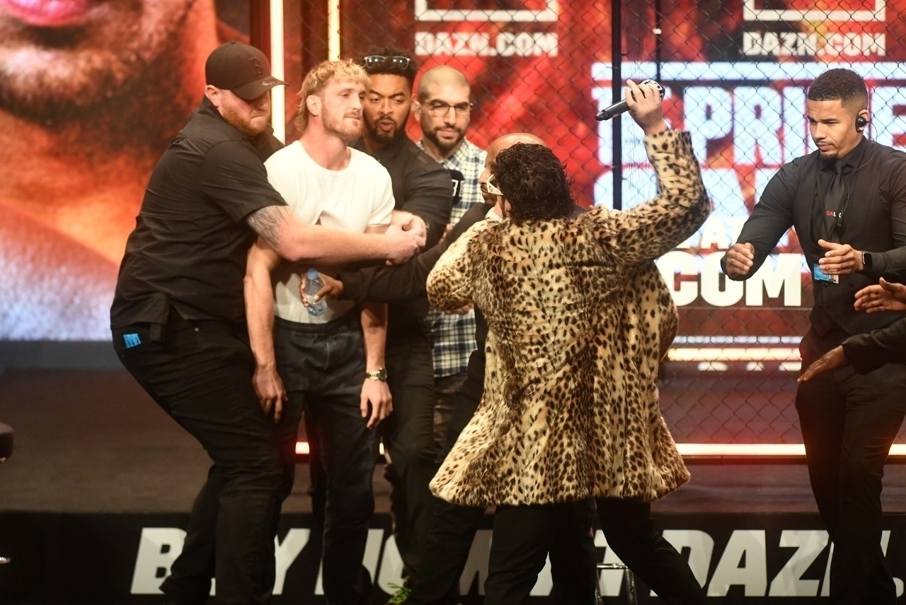 Logan Paul attacked by Dillon Danis during a chaotic press conference