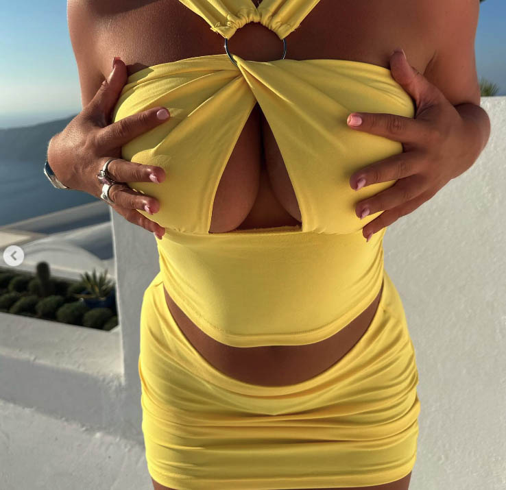 BOSSING Ring girl Apollonia Llewellyn risks Instagram ban with steamy yellow outfit