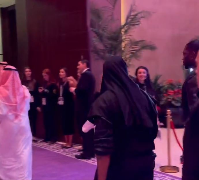 Kanye West's appearance in a mystery Premier League shirt for Tyson Fury and Francis Ngannou has left fans baffled