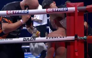 Fans Left Perplexed as Boxer's Corner Man Takes Phone Call During Fight