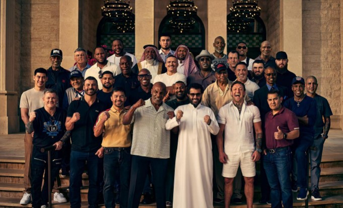Mastermind behind Fury vs Usyk poses in one of greatest boxing pics of all time with legends including Mike Tyson