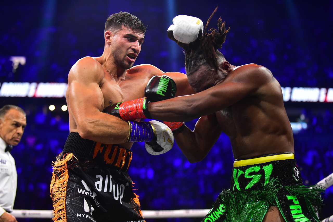Tommy Fury Flexes Bulging Biceps as He Teases 'Massive Year' Ahead - But KSI Fans Crash His Instagram Post