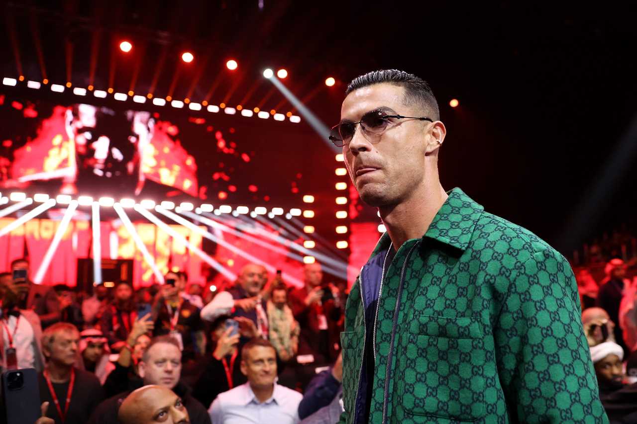 Cristiano Ronaldo Ringside at Boxing Event in Stylish Gucci Jacket