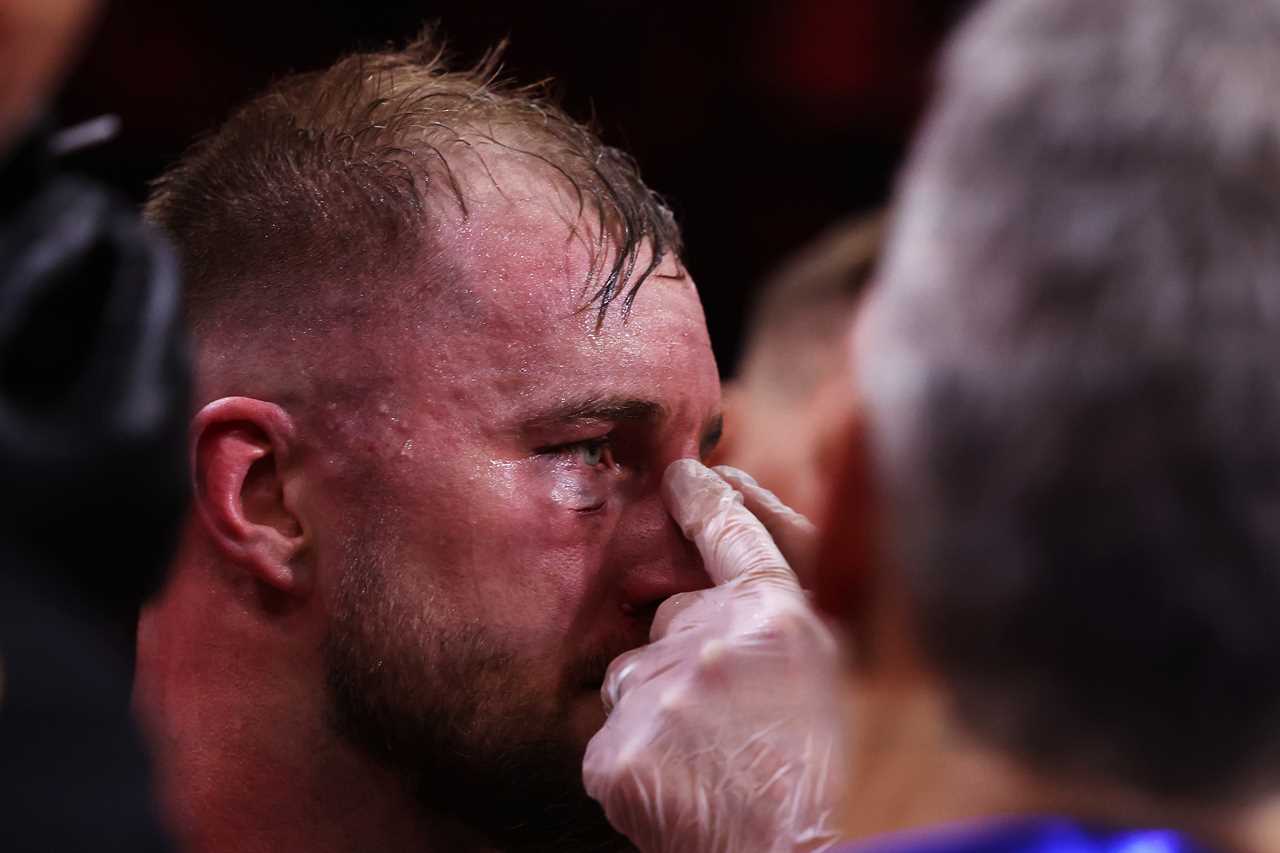 Medics treat Otto Wallin for suspected broken nose after brutal Anthony Joshua defeat