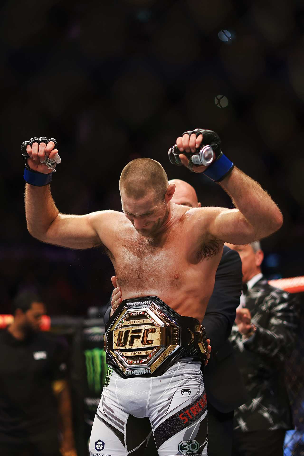 What is Sean Strickland's fight record and who is he?