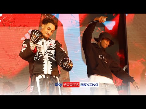Octavian walks with Ben Whittaker in the ring