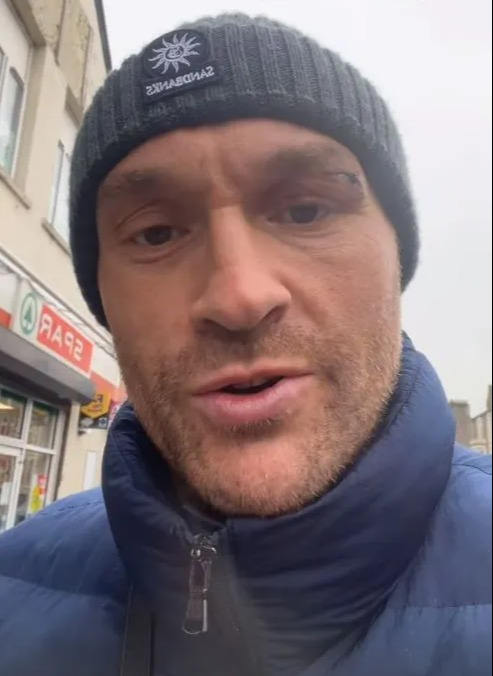 Tyson Fury returns home with a horror eye cut after delaying fight