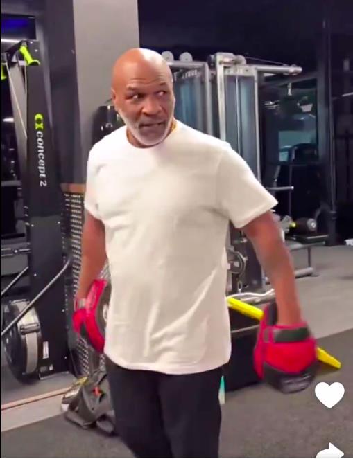 Mike Tyson warns over-excited fan during training session