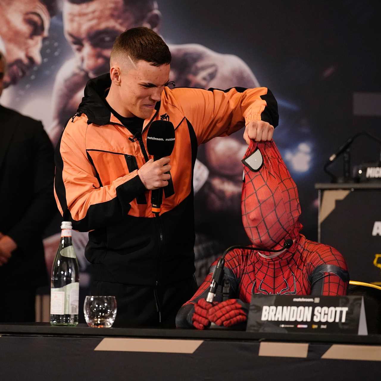 Eddie Hearn is left confused as 'Spider-Man,' unmasked during a press conference