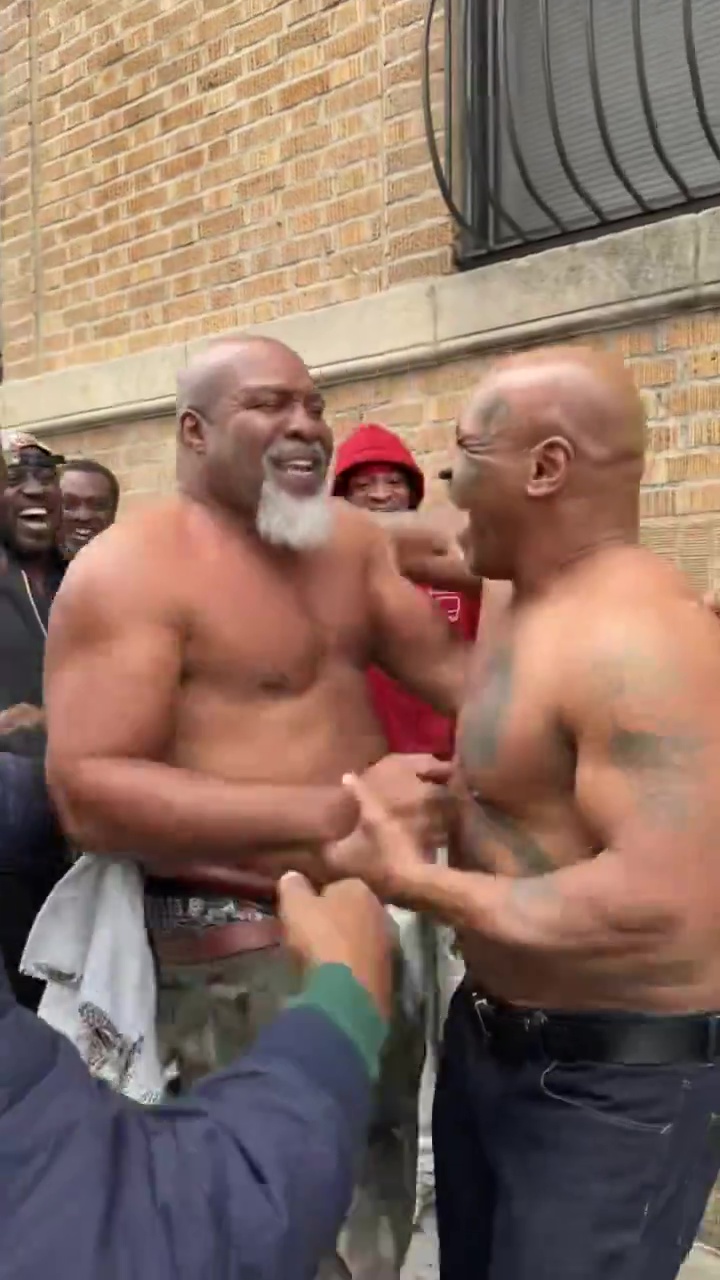 Mike Tyson Displays Ripped Physique During Street Brawl With Shannon Briggs