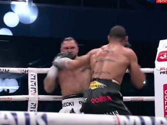 Boxer Falls Through Ropes After Spectacular Left Hook