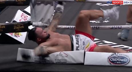 Boxer Falls Through Ropes After Spectacular Left Hook