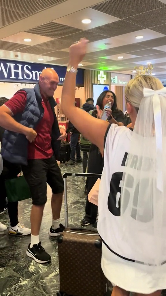 Tyson Fury Dances with Hen Party at London Train Station