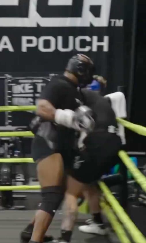 Mike Tyson Knocks Down Sparring Partner with Brutal Left Hook in Training for Jake Paul Showdown