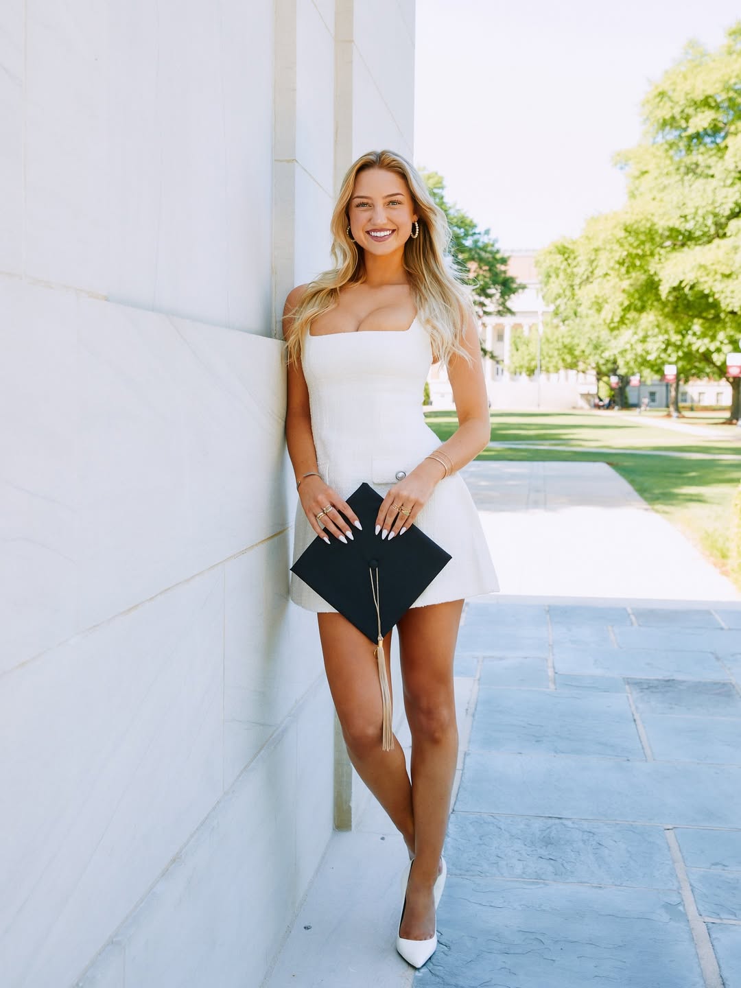 EXCLUSIVE: Sydney Thomas' Champagne Celebration Turns Graduation into Campus Scandal!